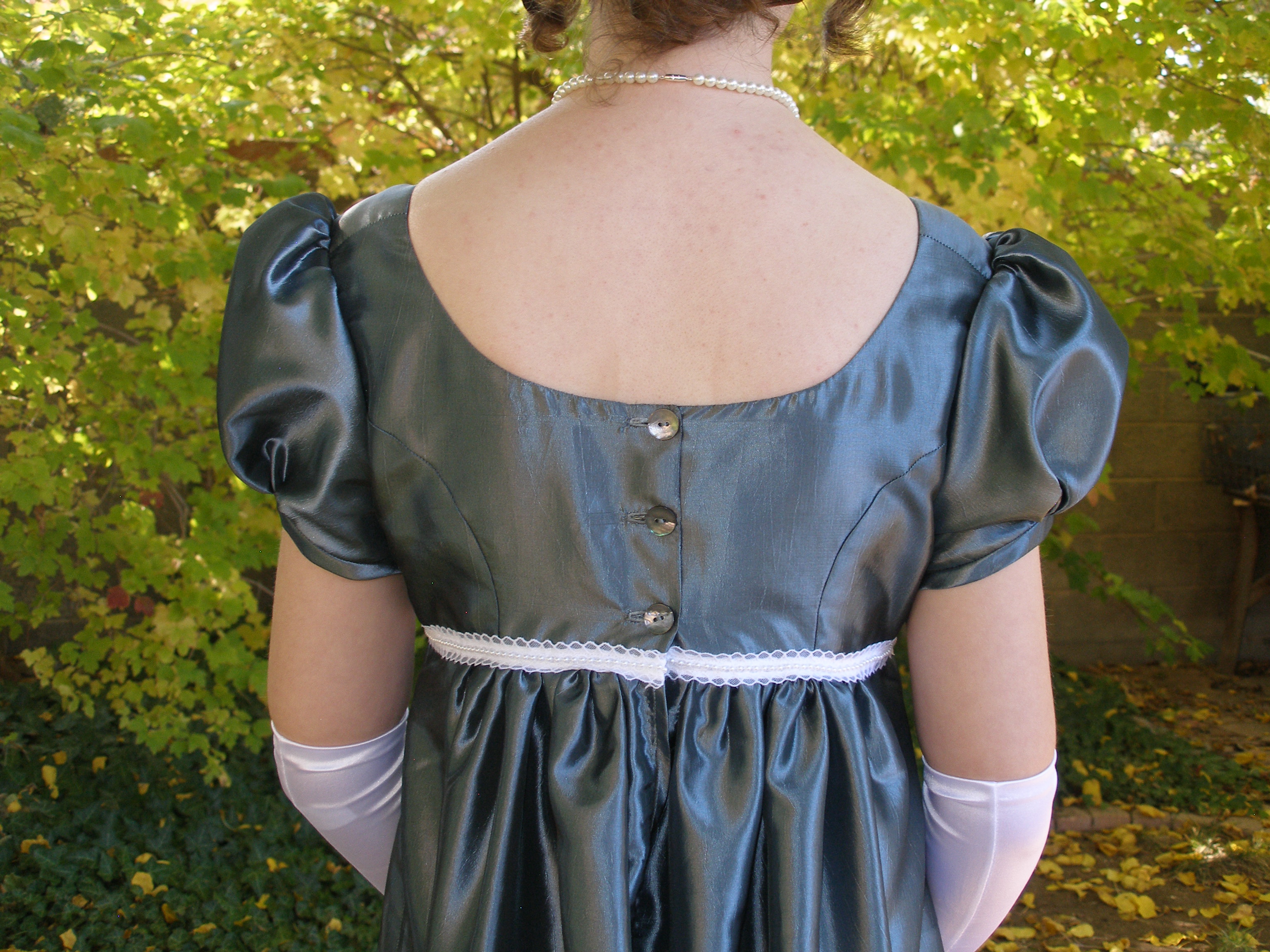 Dress with three buttons